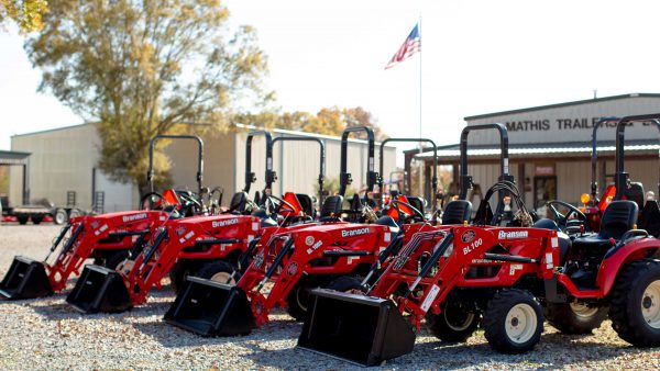 Branson tractors lined up in front of the store